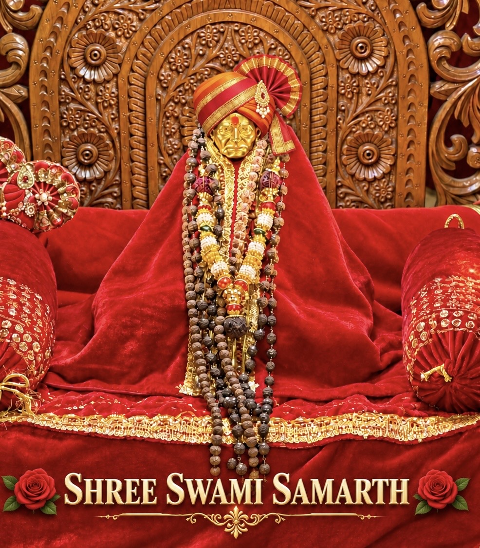 Shree Swami Samarth wearing a red and gold pheta, with garlands and red robes